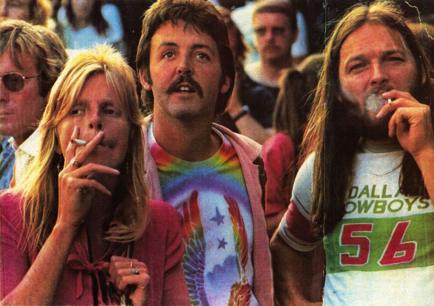 Linda and Paul McCartney with Pink Floyd’s David Gilmour at Knebworth Festival, England, 1976.